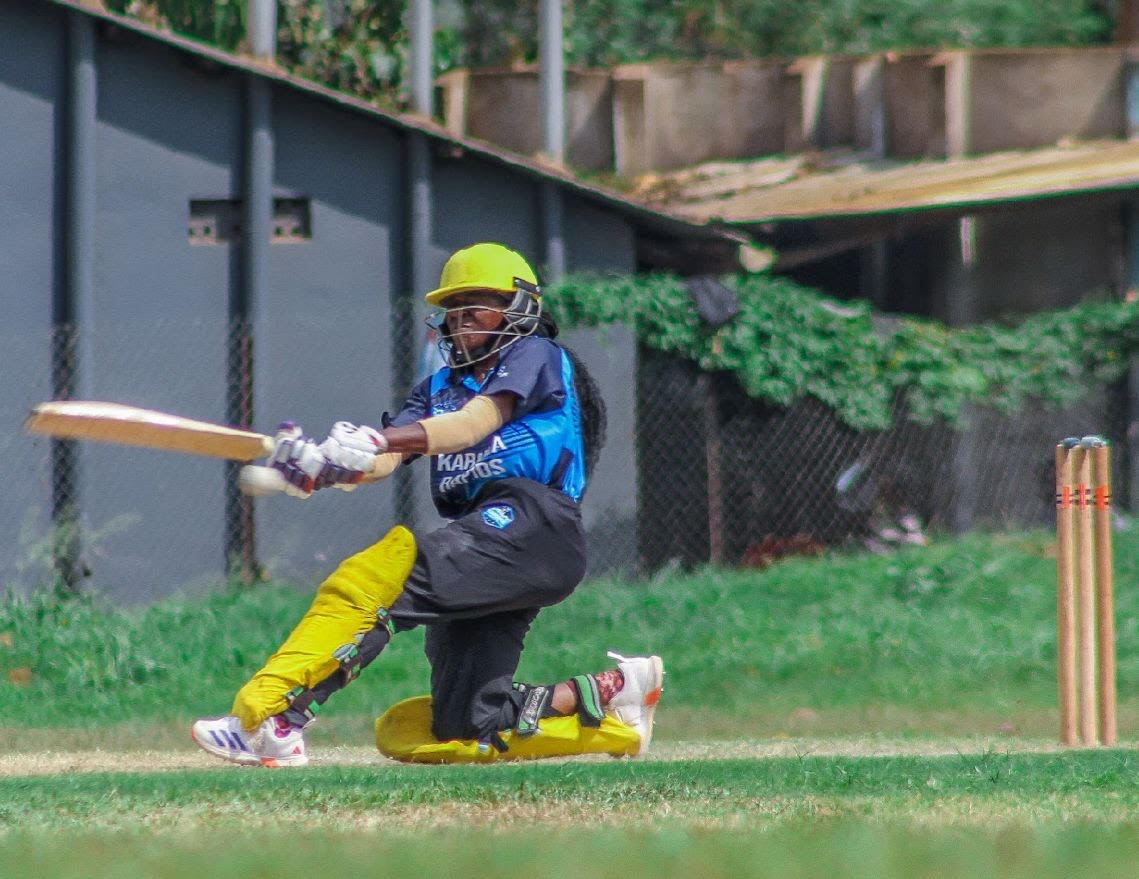Rita Musamali Playing a sweep shot